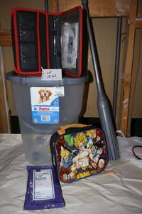 lot 261 image: Pet food container (missing one wheel), mop, lunch bag and more