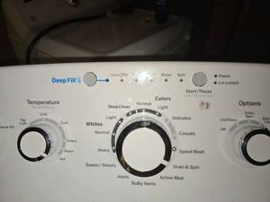 lot 7 image: GE Washing machine.  Model GTW465ASN8WW. Start button has been fixed and working.