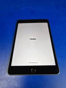 lot 21 image: Apple iPad A2133 w 7.9 Screen & 64GB.  Has been factory reset.