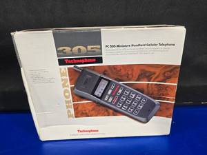 lot 101 image: Retro 1992 Technophone PC 305 Miniature Handhelp Cellular Telephone w Original Box, Charger & Manual