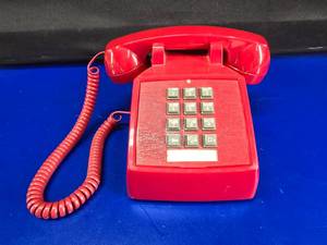 lot 166 image: Vintage New Old Stock Red Cortelco Phone