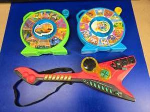 lot 172 image: Lot of Vintage Toys.  2 Mattel See N Says From 1989 & A Toy Quest Electric Guitar
