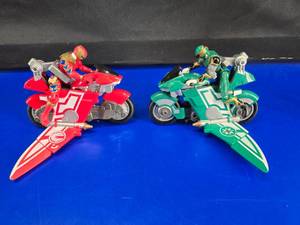 lot 180 image: Vintage 90s Power Rangers Ninja Storm Red Wind Glider w Figure & Green Wind Glider w Figure