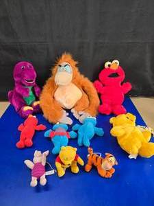 lot 184 image: Lot of Vintage Childrens Plush.  Includes Disney, Sesame Street, Barney & Winnie The Pooh