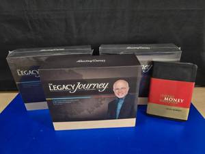 lot 235 image: Lot of Dave Ramsey Material.  Includes 3 Legacy Journey Boxed Sets & The Total Money Makeover Journal