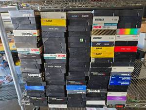 lot 280 image: MASSIVE Lot of Approx 175 Pre-Recorded VHS Tapes.  Tapes are re-recordable.  Includes vintage shows, movies, cartoons, awards shows, commercials and MORE