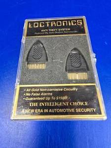 lot 332 image: Vintage Loctronics Anti Theft System.  Looks New.