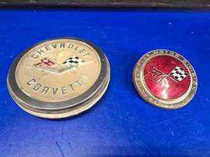 lot 355 image: Lot of 2 Corvette Emblems.  Includes 1958-1961 Emblem & 1973-1974 Sunburst Emblem
