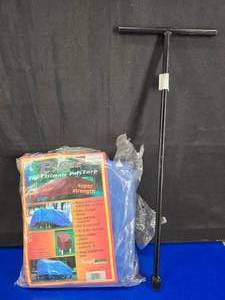 lot 400 image: Outdoor Lot.  Includes New Tarp & Water Disconnect Key
