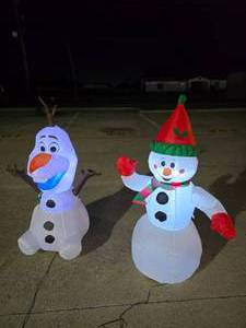 lot 409 image: Lot of 2 Showman Inflatables.  1 Christmas & 1 Frozen.  Tested