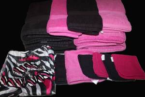 lot 45 image: Black and Pink Bathroom Items, Shower Curtain with Hooks, 3 Black and 3 Pink Towels, 2 Black and 2 Pink Handle Towles, and 2 black and 2 darker Pink wash clothes