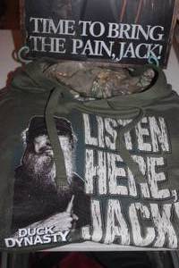 lot 93 image: Duck Dynasty Metal Sign and Hoodie