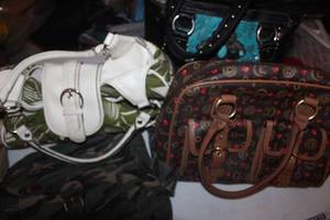 lot 103 image: Four Purses As shown