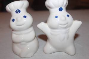 lot 125 image: Ceramic Pillsbury Dough Boy Sale and Pepper Shakers