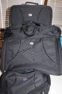 lot 174 image: American Tourist Luggage Set, 3 Pieces, Rolling Suitcase, Garment Bag and Small Duffle Bag