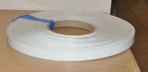 lot 152 image: Roll of Frosty White PVC Edge Banding