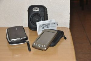 lot 162 image: Plug and Play Speaker, GPS and Palm Pilot