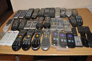 lot 163 image: Large Quantity of Remotes, Some Never Used, Hisense Roku Remotes, All in One Remotes, Bed Remotes and More