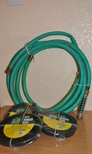 lot 179 image: Three New Soaker Hoses and Connecting Hoses