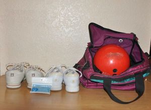 lot 213 image: Bowling Ball, Bag and Two Pairs of Shoes