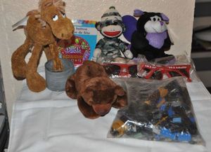lot 89 image: Stuffed Animals and Legos, Vintage Slinky