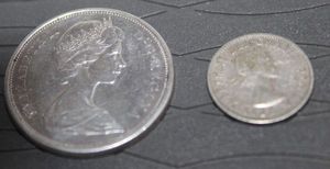 lot 7 image: 1965 Fifty Cent Candian Coin & 1953 Canadian Dime Both 80% Silver