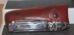 lot 8 image: Vintage French Seaboard Steel Multitool with Leather Case