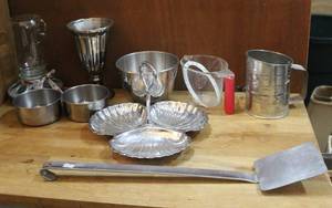 lot 232 image: Sifter measuring cup metal bowls and more see pictures