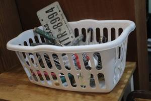 lot 215 image: Laundry basket full of painting tools and more see pictures