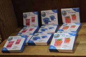 lot 214 image: 11 - swimming arm bands with flamingos, sharks and strawberries
