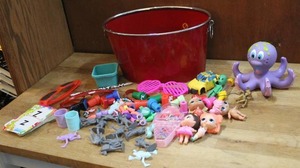 lot 204 image: Metal bucket full of small toys