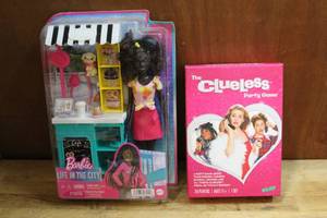 lot 187 image: Barbie life in the city unopened and the clueless party game
