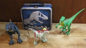 lot 166 image: Dinosaur lunch box and toys