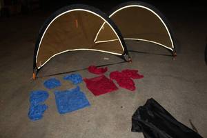 lot 145 image: To pop up goals with blue and red team net  shirts