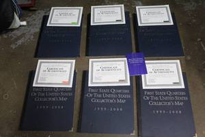 lot 142 image: 6 - First State quarters of the United States collectors maps with certificate of authenticity (there is not any quarters in them)