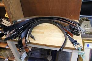 lot 134 image: Large mixed  lot of belts that are around 32 in size mixed brands