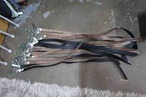 lot 133 image: Large lot of reversible belts that are 42 size