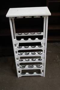 lot 132 image: Large wine rack that holds about 22 bottles and also you can hang your glasses
