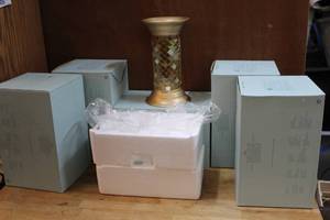 lot 121 image: 5 Party Lite candle holders opened one to show what they look like