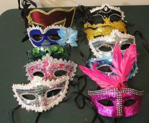 lot 294 image: a collection of Venetian masks