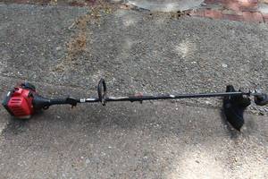 lot 288 image: Troy-bilt weed eater