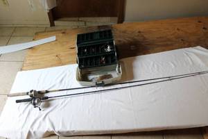 lot 281 image: Two fishing poles and tackle box