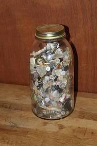 lot 93 image: Large jar about 10 tall full of vintage buttons