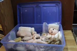 lot 103 image: Tote full of doll parts craft lot