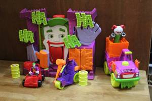 lot 116 image: Previously loved Fisher-Price Imaginext DC Super Friends The Joker Laff Factory Playset.