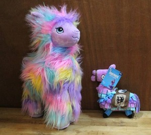 lot 117 image: Furbulous Rainbow Tie-Dye Llama stuffed plush and a Fortnite Llama Loot Plush