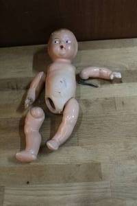 lot 61 image: Vintage doll that need some repairs see pictures
