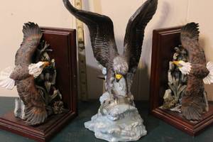 lot 258 image: Eagle figure about 10 inches tall and two eagle figure bookends