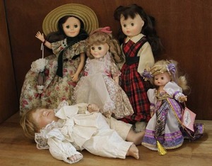 lot 84 image: Mixed Lot of vintage dolls baby in the front is porcelain