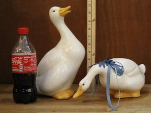 lot 242 image: Two decorative ducks one about 11 inches tall see pictures